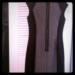 Calvin Klein size 4 dress. It’s chic and brand new